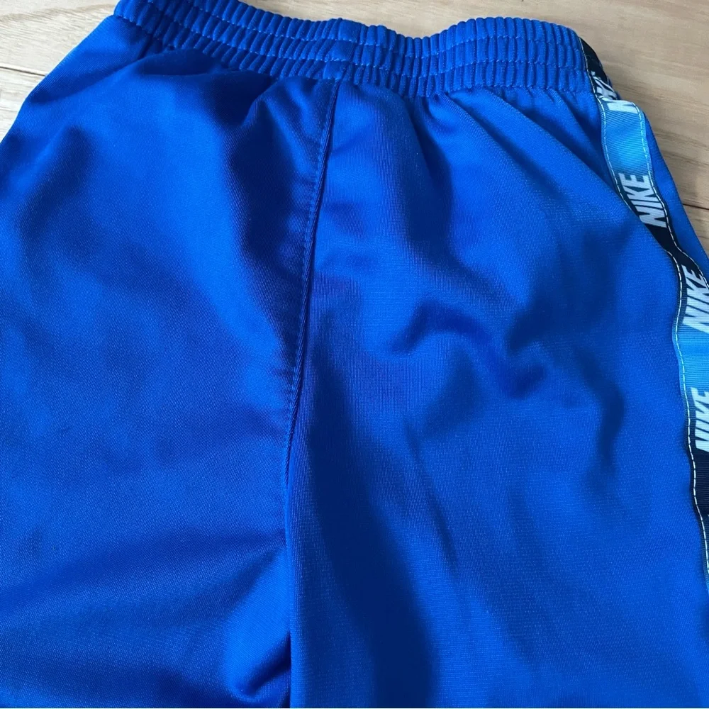 Nike both tracksuits